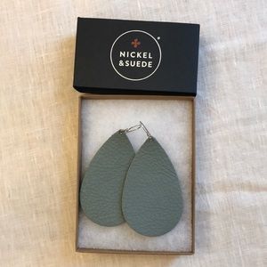 Like new nickel and suede earrings.